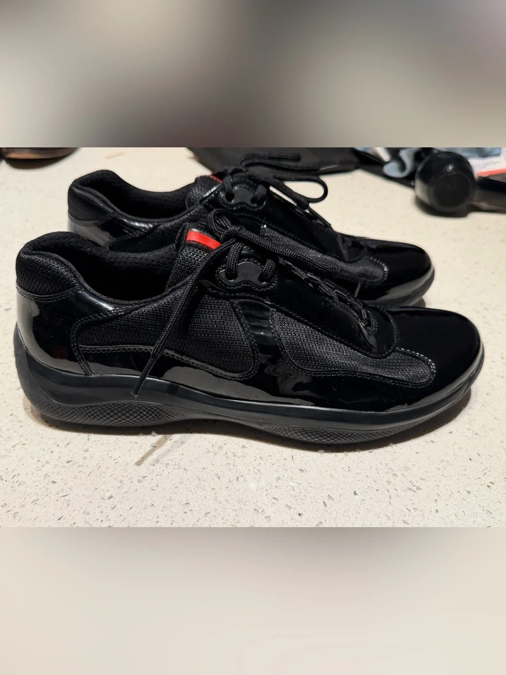 Prada America Cup Black patent leather Athletic Sneakers with Red Accent